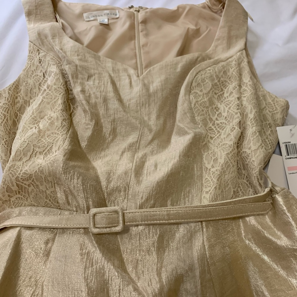 Cream/off-white, shimmery, formal woman’s dress